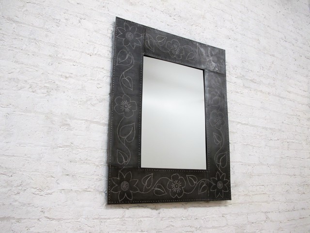 steel mirror with punched flower design