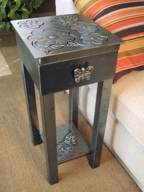metal end table with flowers