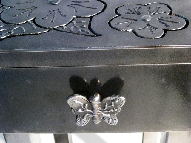 metal end table with flowers